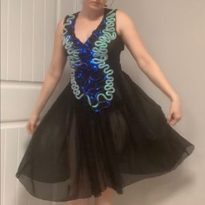 Sheer little black dress with LED string lights